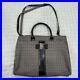 Salvatore-Ferragamo-Houndstooth-Laptop-Bag-01-qtzz