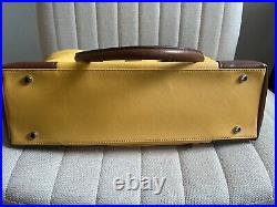 Tumi laptop bag yellow, new with tags